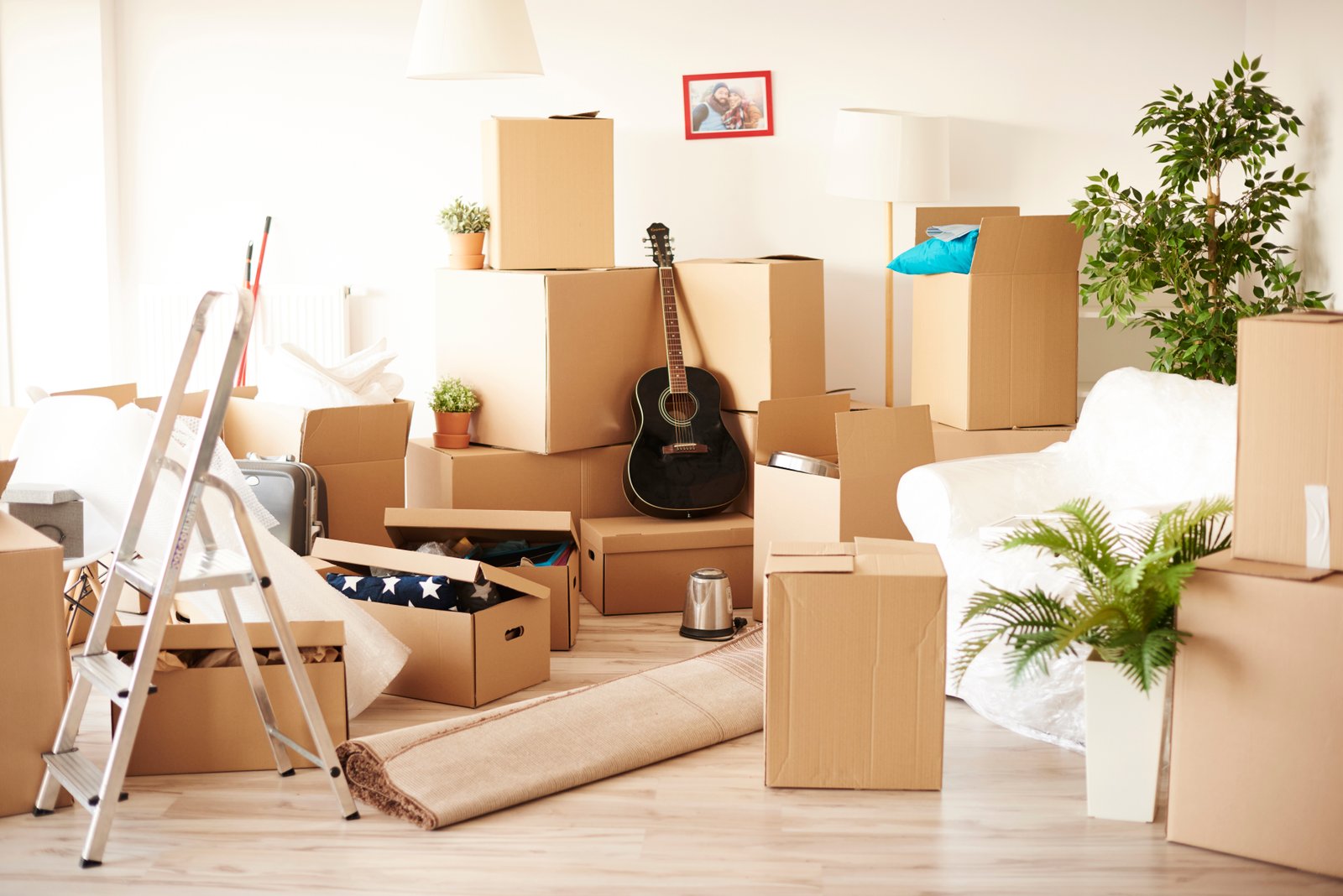 Professional movers handling furniture with care